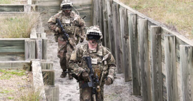 Soldiers wearing the latest prototype of the Integrated Visual Augmentation System (IVAS) during a trench clearing exercise