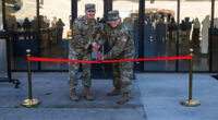 US Space Force leaders participate in a ribbon cutting ceremony for the opening of The Crucible Innovation Lab at Vandenberg Space Force Base, California