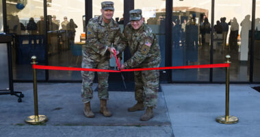 US Space Force leaders participate in a ribbon cutting ceremony for the opening of The Crucible Innovation Lab at Vandenberg Space Force Base, California