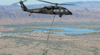 A Black Hawk helicopter demonstrating its ability to fly in autonomous mode and resupply forward forces