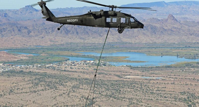 A Black Hawk helicopter demonstrating its ability to fly in autonomous mode and resupply forward forces