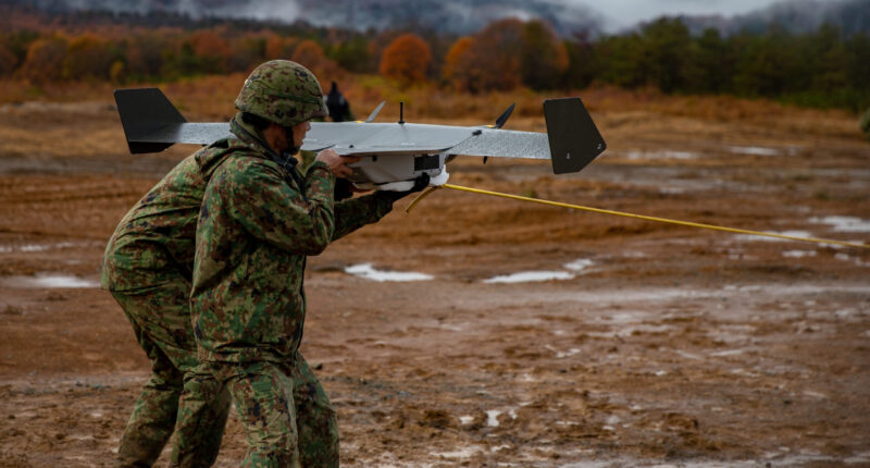 Soldiers using an unmanned aerial vehicle during Forest Light Middle Army in Aibano Training Area, Shiga, Japan