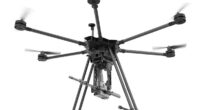 A drone equipped with the SMASH Dragon advanced robotic weapon