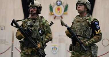 Greek soldiers wearing their new combat uniform