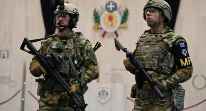 Greek soldiers wearing their new combat uniform