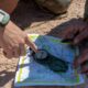 US Air Force personnel determine their location on a map at the Fort Meade Training Area