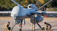 US Air National Guard maintainers perform post-flight maintenance on an MQ-9 Reaper