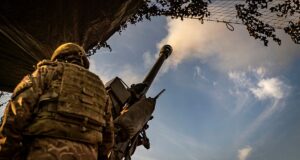 A soldier from the Royal Scots Dragoon Guards operating an anti-aircraft gun during Exercise Steadfast Defender, demonstrating mobile air defense capabilities.