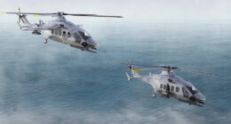 Two gray camouflage Airbus military helicopters fly in formation over a calm ocean beneath an overcast sky.