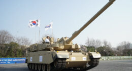 South Korean K2 Black Panther main battle tank kicking up dust during a high-speed field exercise, showcasing the platform's mobility and combat readiness