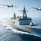 Digital render of a stealth-hulled European frigate underway with two surveillance drones overhead, representing Indra's 4D multiband radar development program